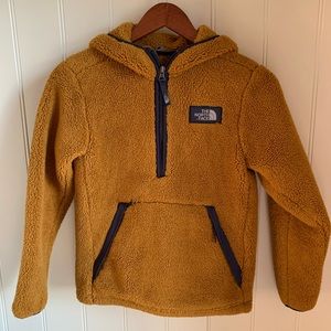 The North Face fleece pullover jacket.